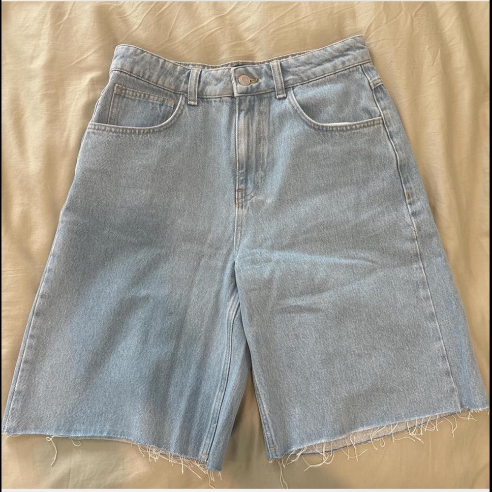 ASOS DESIGN light wash denim jorts with raw hem